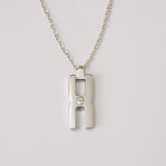 Pendentif Hera O argent rhodié - collier mémoriel avec compartiment pour mèche de cheveux, cadeau unique et précieux
